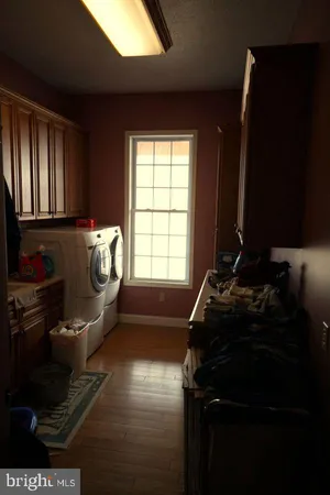 a view of a porch with wooden floor