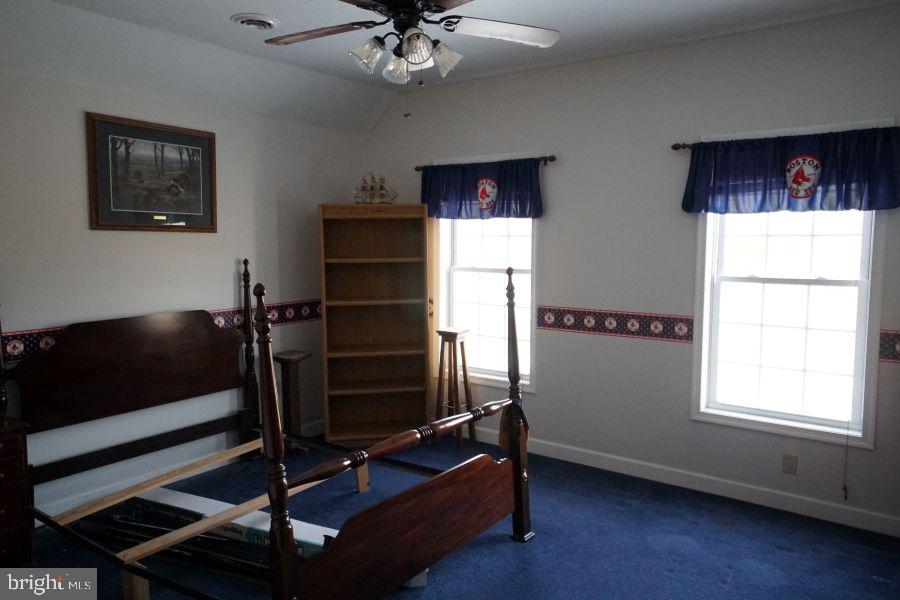 255 Troublesome Valley Road Franklin, WV 26807 - Photo 43 of 72 a living room with furniture and a flat screen tv