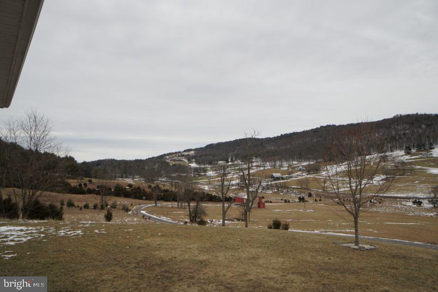 255 Troublesome Valley Road Franklin, WV 26807 - Photo 72 of 72 a view of a town with mountains in the background
