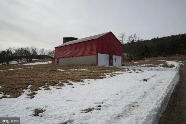 a view of a house with a snow