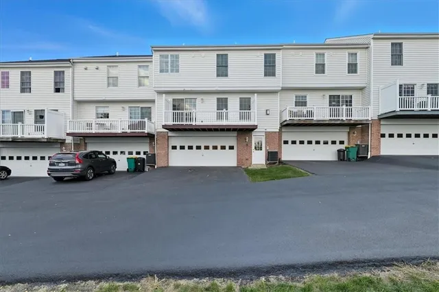 a view of a street with cars