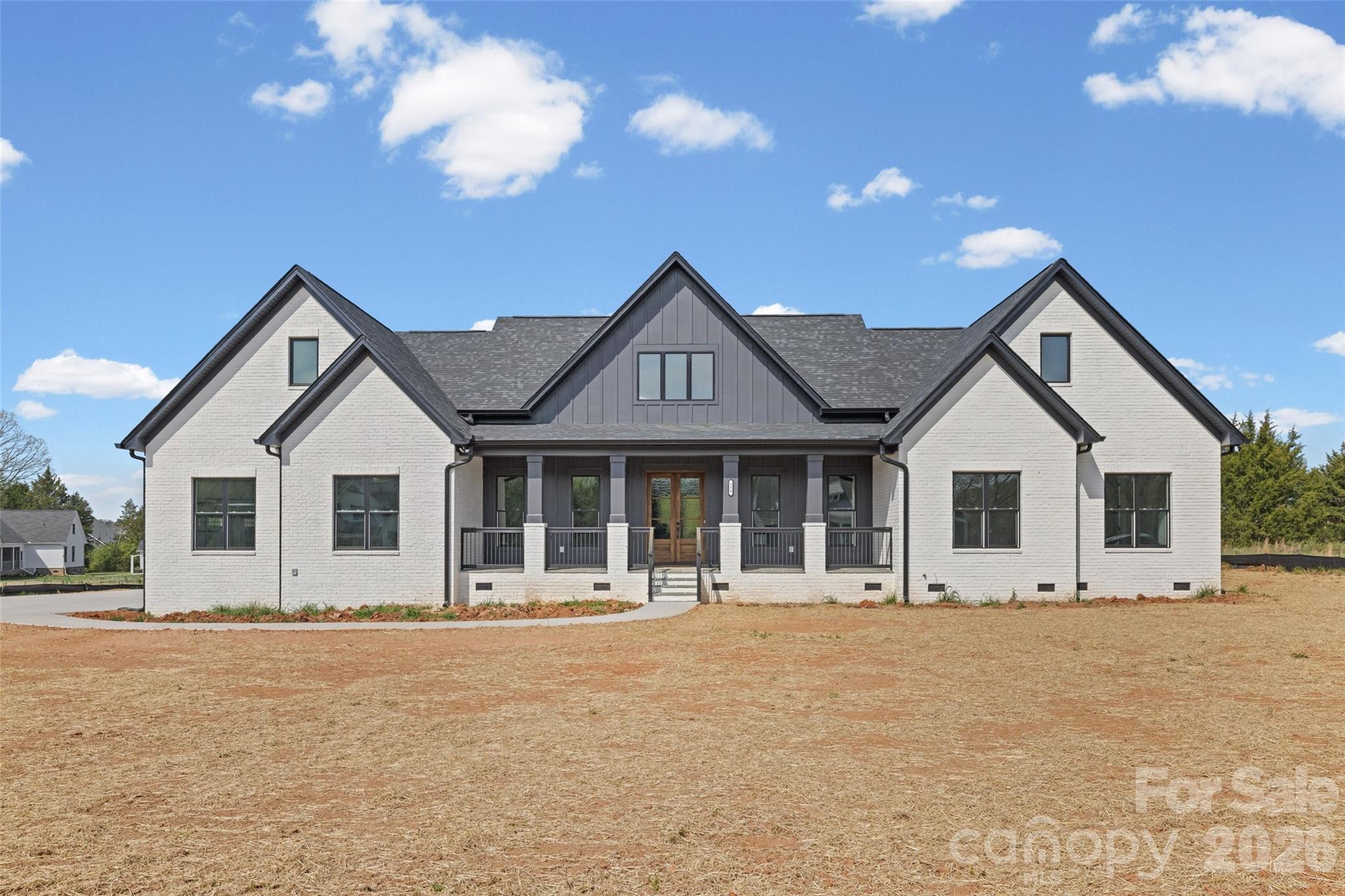 254 Triple Ponds Court Clover, SC 29710 - Photo 1 of 45 a front view of a house with a yard