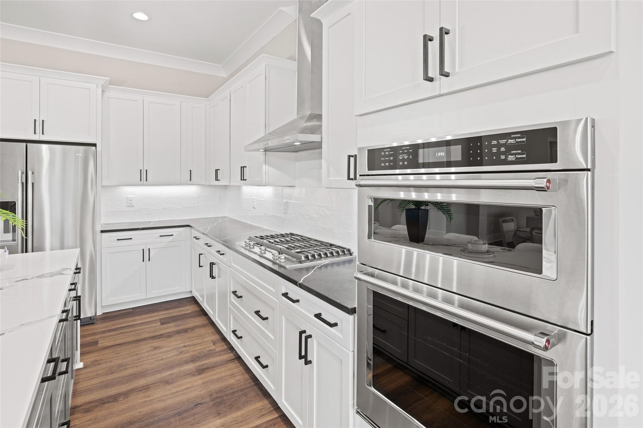 254 Triple Ponds Court Clover, SC 29710 - Photo 12 of 45 a kitchen with cabinets and steel appliances