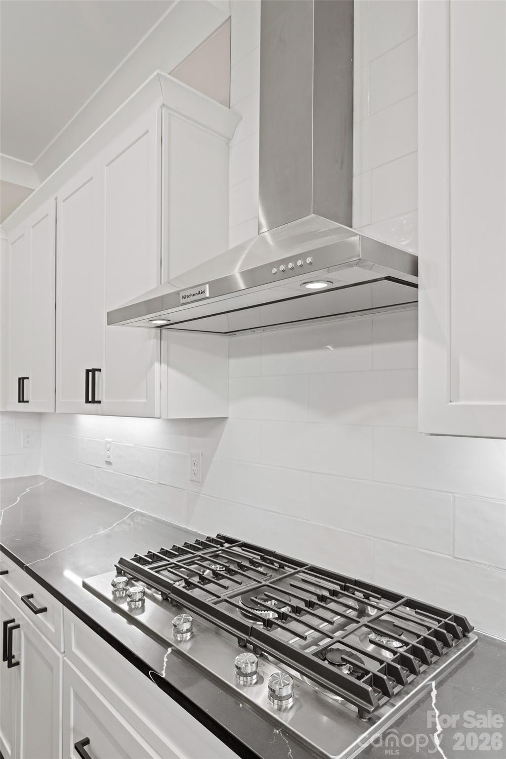 254 Triple Ponds Court Clover, SC 29710 - Photo 13 of 45 a stove top oven sitting inside of a kitchen