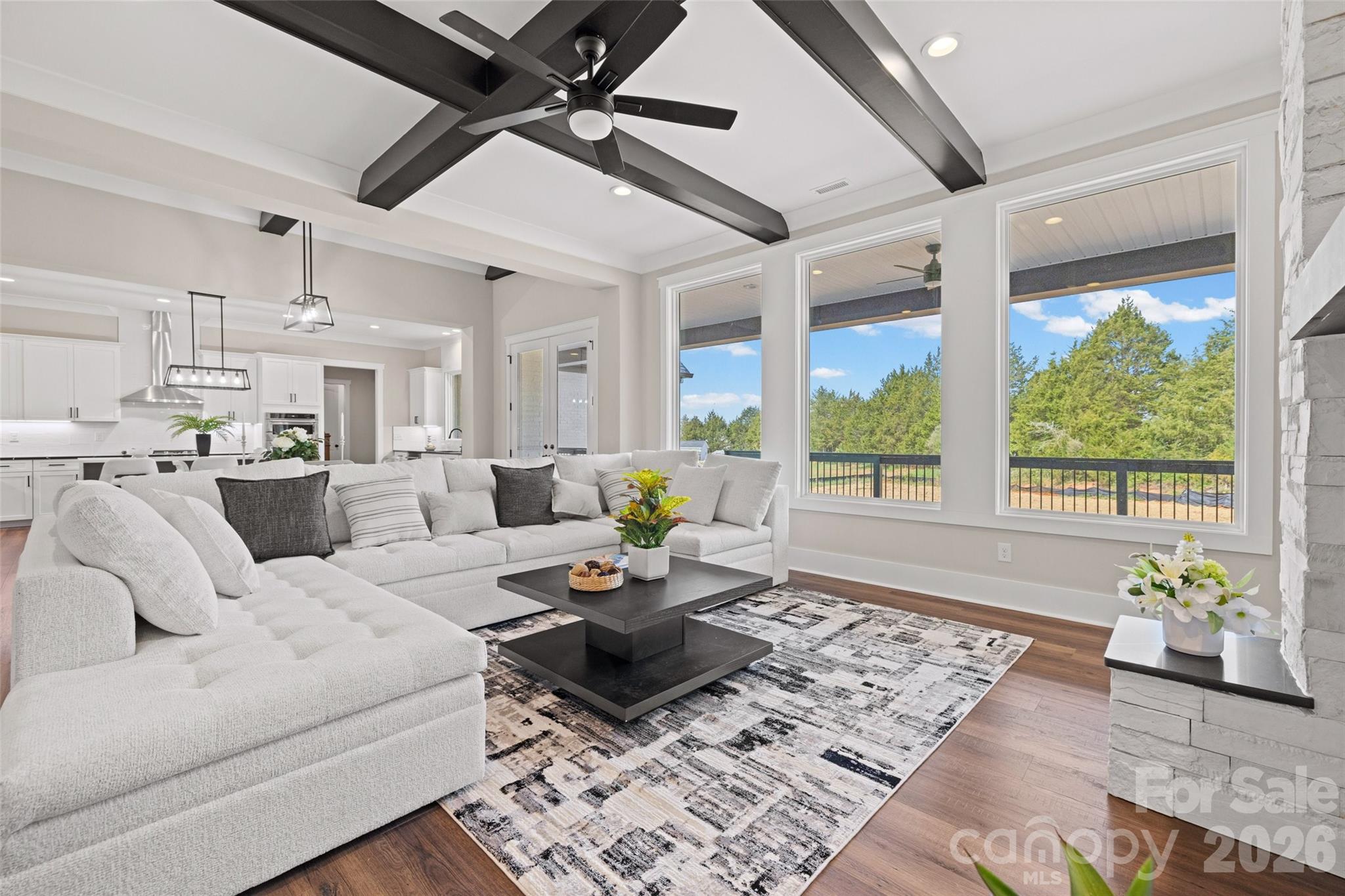 254 Triple Ponds Court Clover, SC 29710 - Photo 19 of 45 a living room with furniture and a large window
