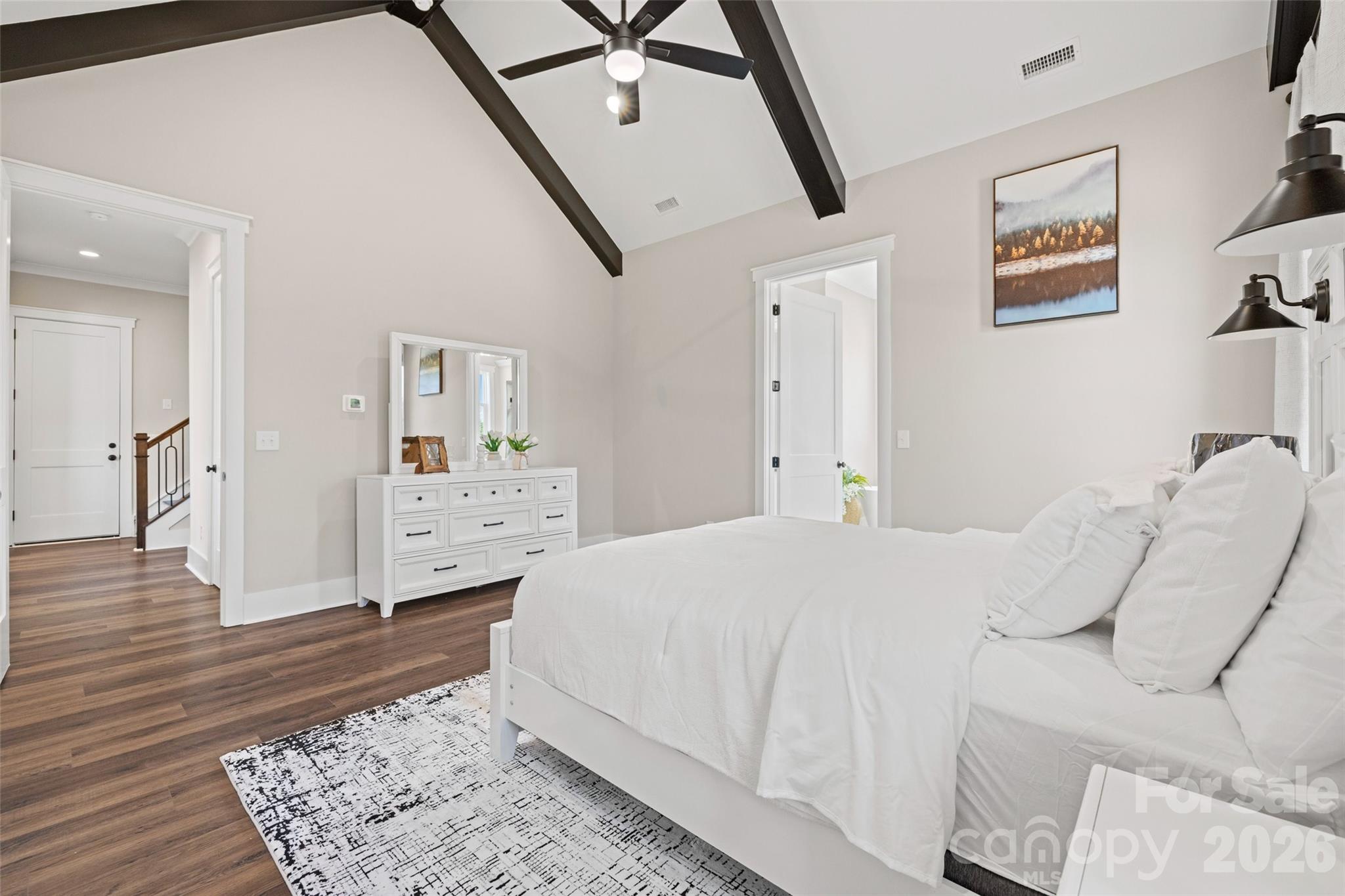254 Triple Ponds Court Clover, SC 29710 - Photo 24 of 45 a bedroom with a bed and a rug