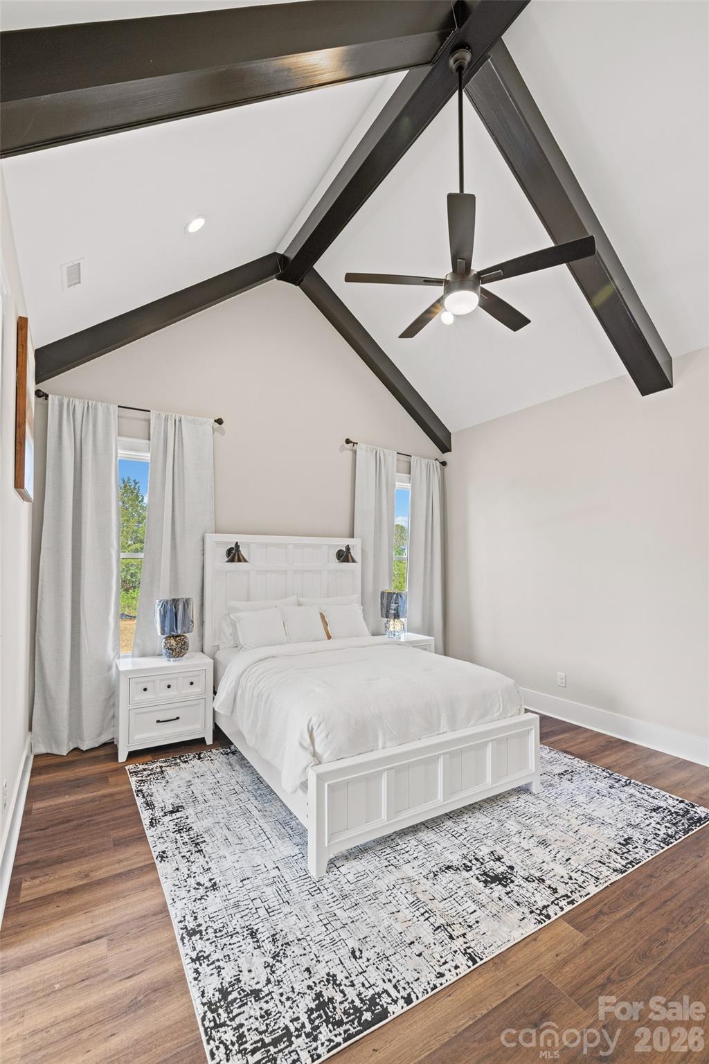 254 Triple Ponds Court Clover, SC 29710 - Photo 25 of 45 a large bed sitting in a spacious bedroom next to a window