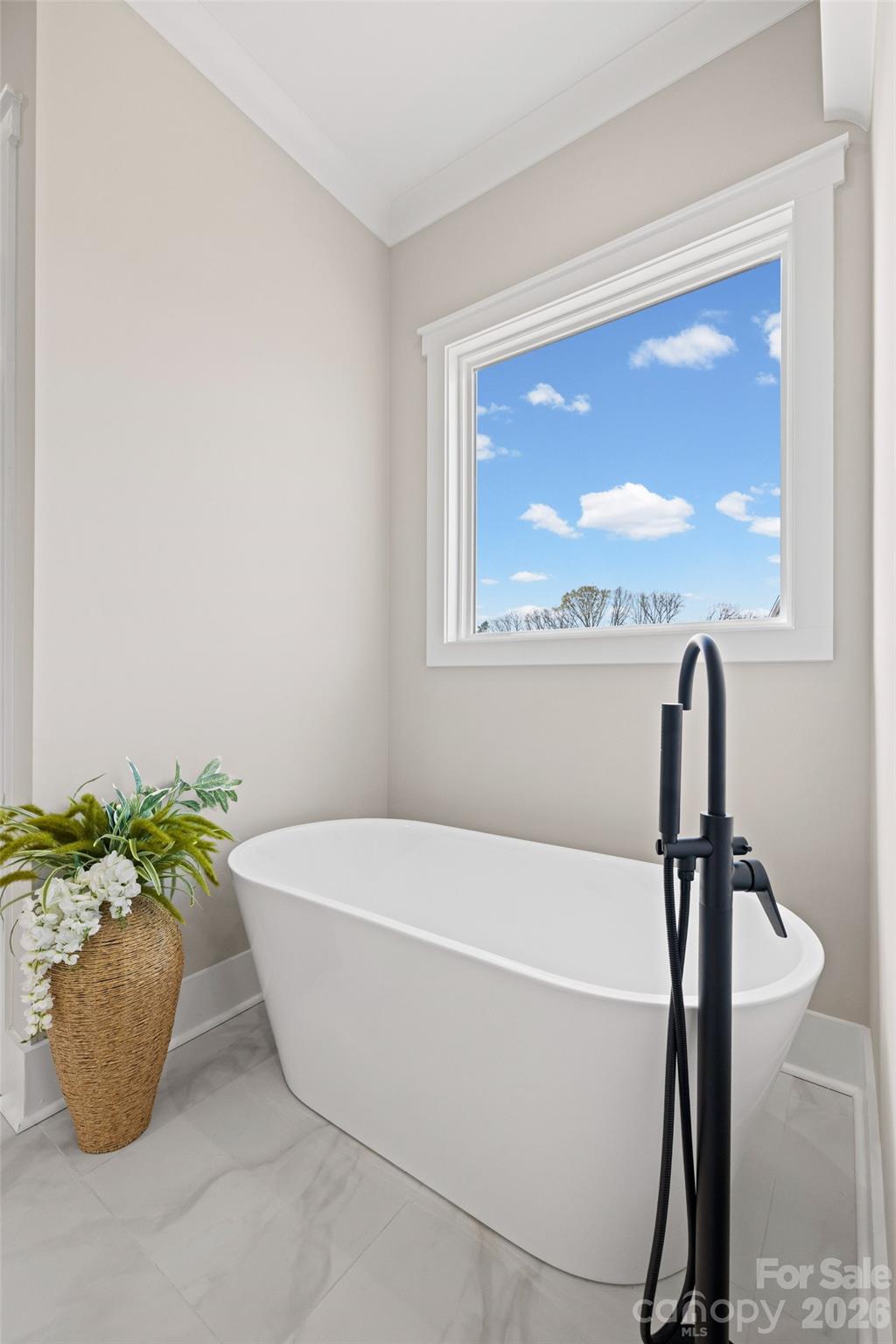 254 Triple Ponds Court Clover, SC 29710 - Photo 30 of 45 a white bath tub sitting in a bathroom