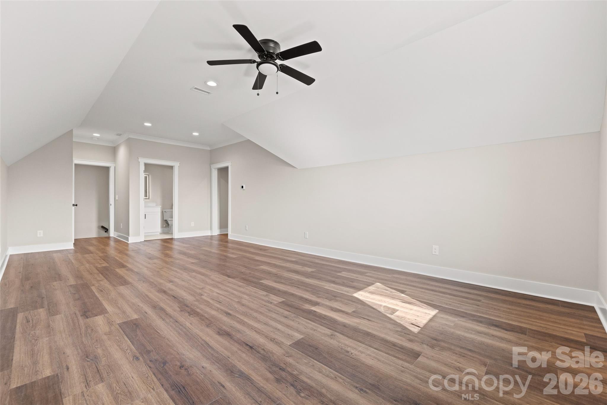 254 Triple Ponds Court Clover, SC 29710 - Photo 42 of 45 a view of empty room with wooden floor and fan