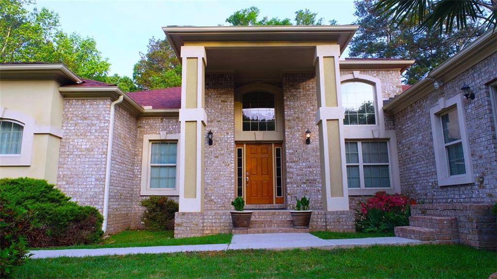 4901 Lower Jersey Road Oxford, GA 30054 - Photo 1 of 1 front view of a house with a yard