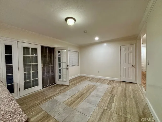 a view of empty room with windows