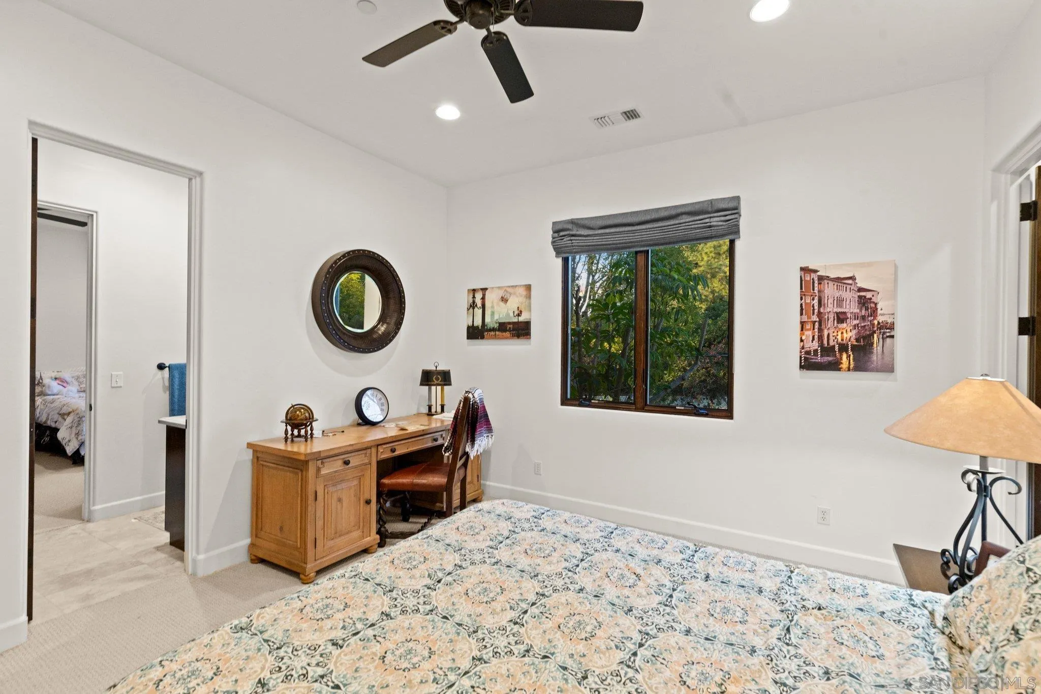 29746 Nella Lane Bonsall, CA 92084 - Photo 19 of 39 a bedroom with a bed and a window