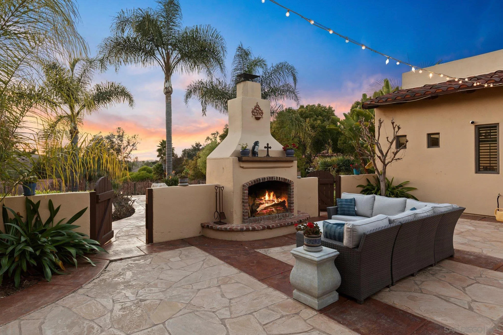 29746 Nella Lane Bonsall, CA 92084 - Photo 28 of 39 a view of a patio with couches and a fire pit