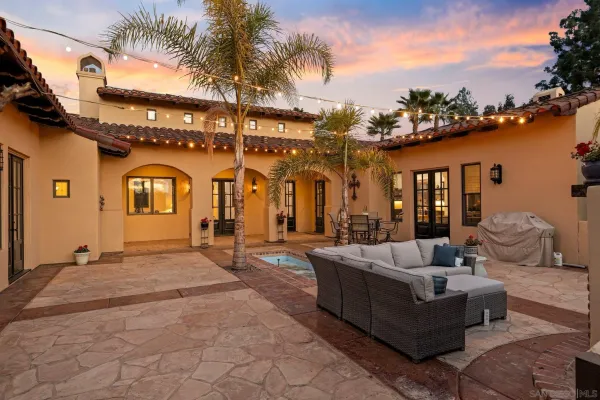 a building outdoor space with patio furniture