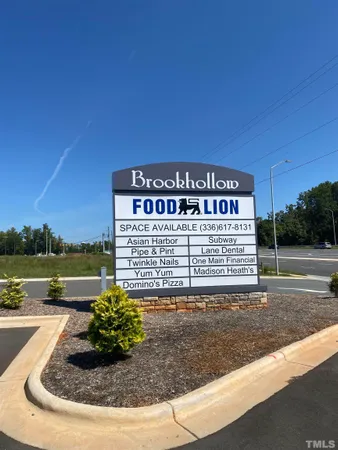 a view of a pathway with a park