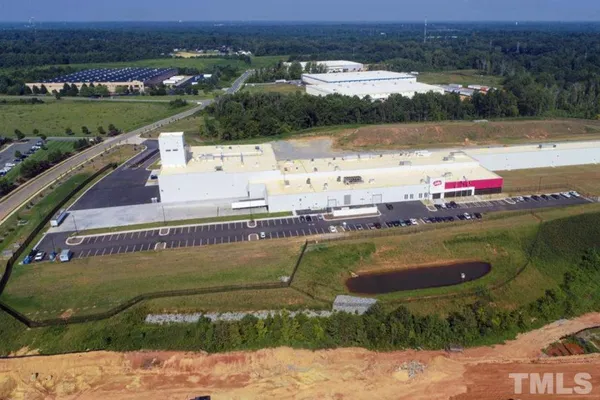 a view of a lake with a yard