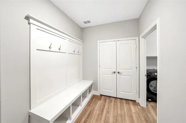 a view of bathroom with a tub and shower