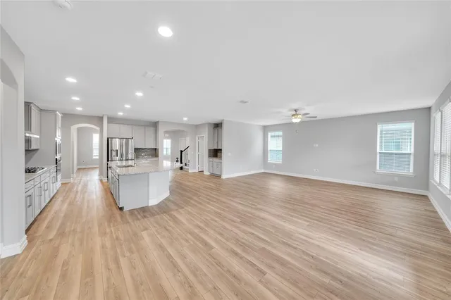 a view of kitchen and kitchen with sink