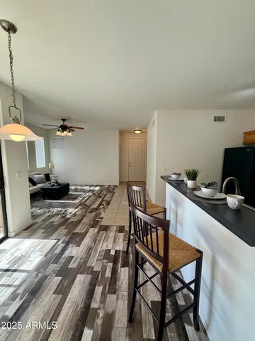 a bedroom with a bed and a table