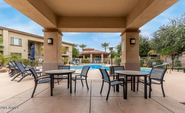 a bedroom with bed and window