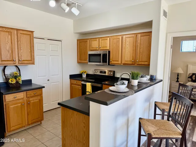 a backyard of a house with seating space