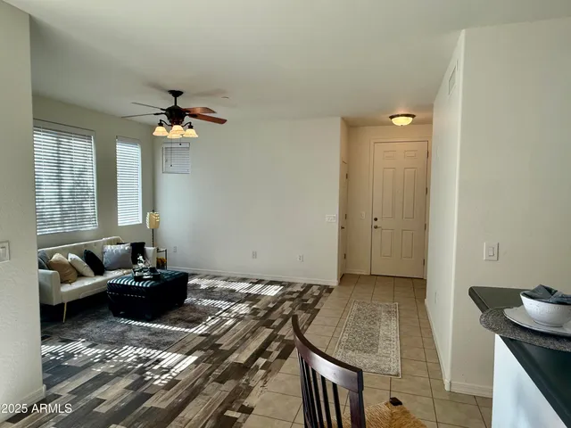 a bedroom with furniture and windows