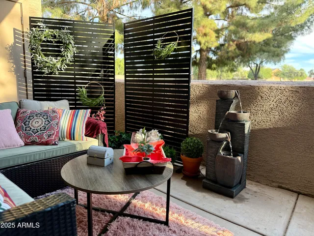 a backyard of a house with seating space