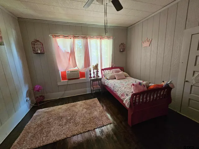 a kitchen with stainless steel appliances a sink stove and cabinets