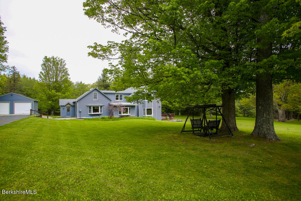 1271 Main Road Savoy, MA 01256 - Photo 11 of 38 a view of a house with a backyard
