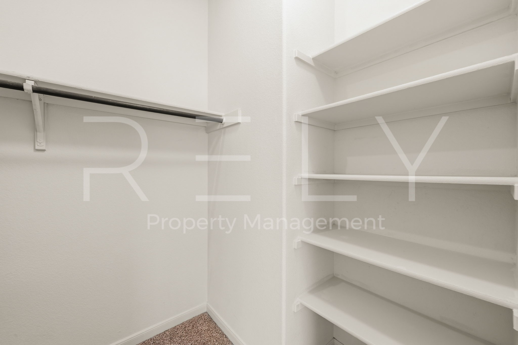 1405 Sunny Meadows Loop Georgetown, TX 78626 - Photo 23 of 40 Ample shelving and hanging space in this well-organized walk-in closet for all your storage needs.
