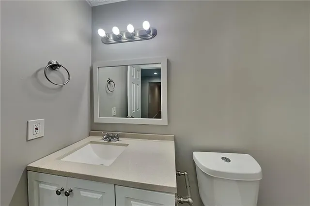 a bathroom with a sink and a toilet