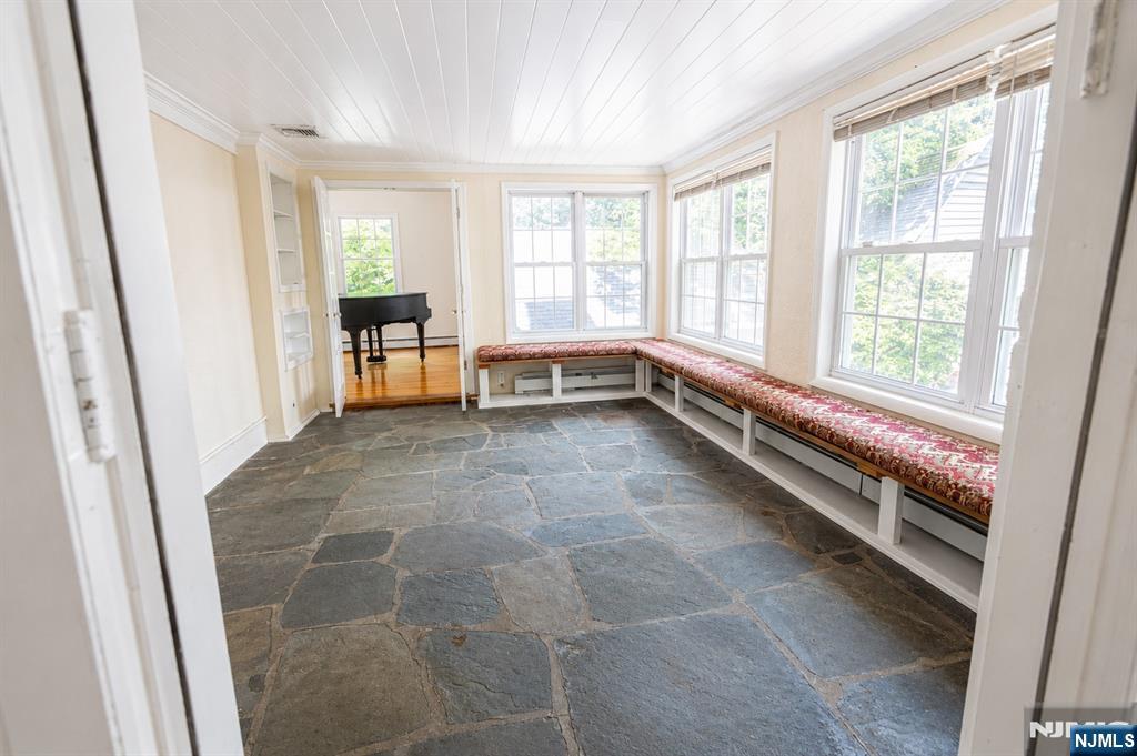 298 Audubon Road Englewood, NJ 07631 - Photo 10 of 19 a large white room with a large window