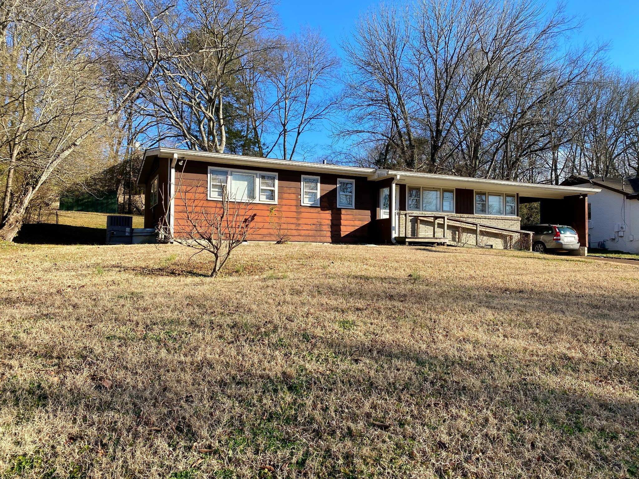5518 Vanderbilt Road Old Hickory, TN 37138 - Photo 16 of 32 a white house that has a tree in front of it