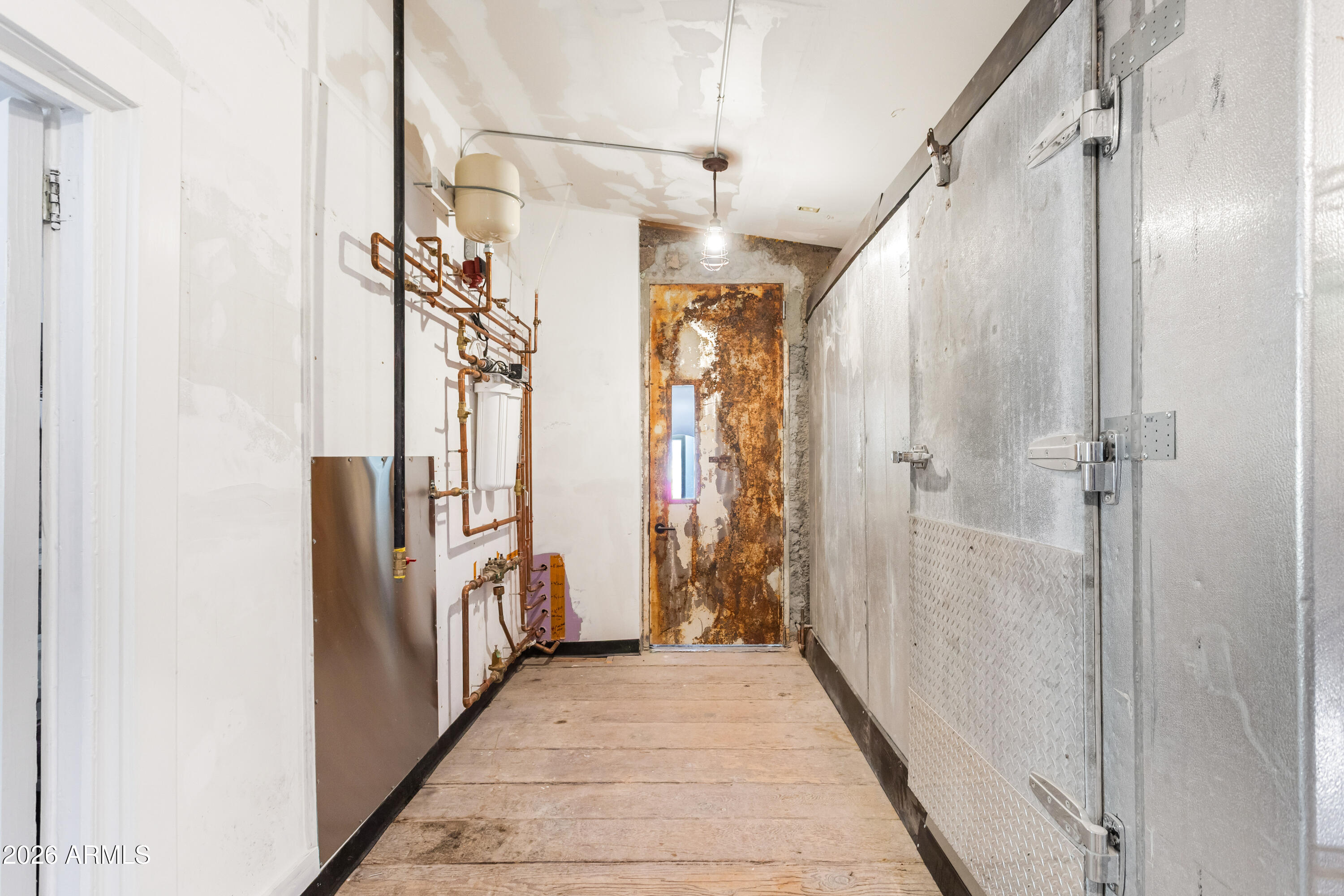 72-78 Main Street Bisbee, AZ 85603 - Photo 26 of 46 a view of hallway with shower