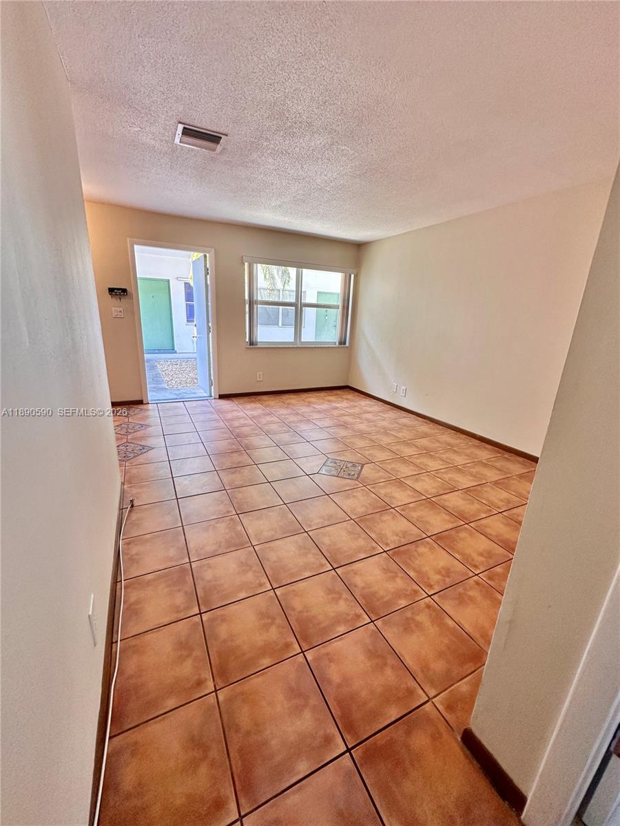 1824 Monroe Street, Unit 4 Hollywood, FL 33020 - Photo 11 of 28 a view of an empty room and a window