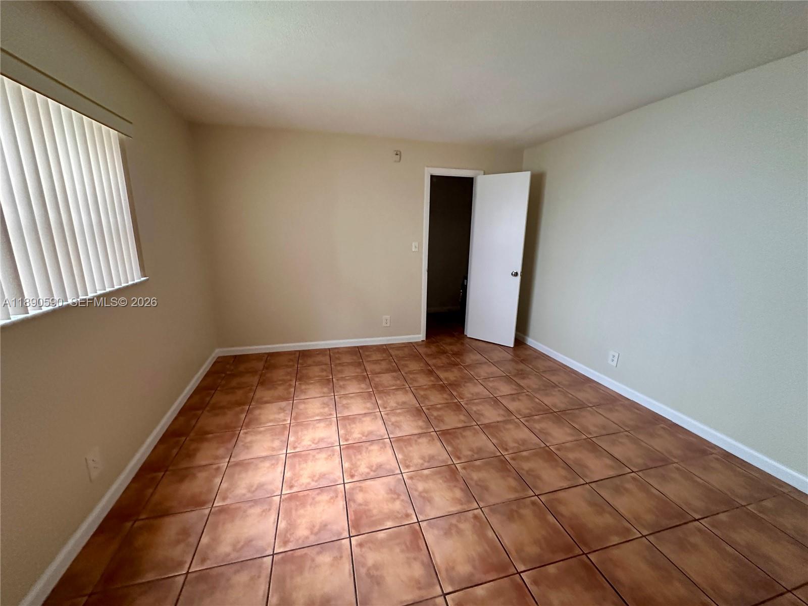 1824 Monroe Street, Unit 4 Hollywood, FL 33020 - Photo 15 of 28 a view of an empty room and window