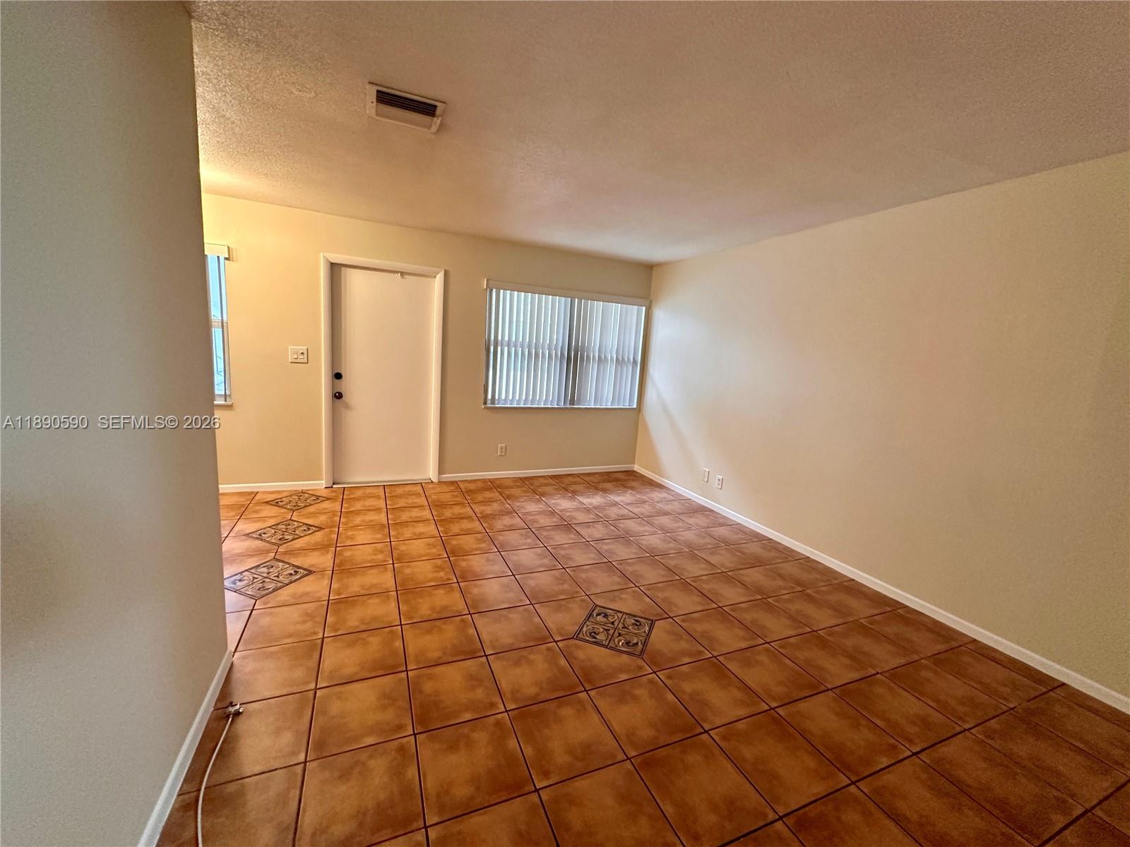 1824 Monroe Street, Unit 4 Hollywood, FL 33020 - Photo 19 of 28 a view of an empty room and window