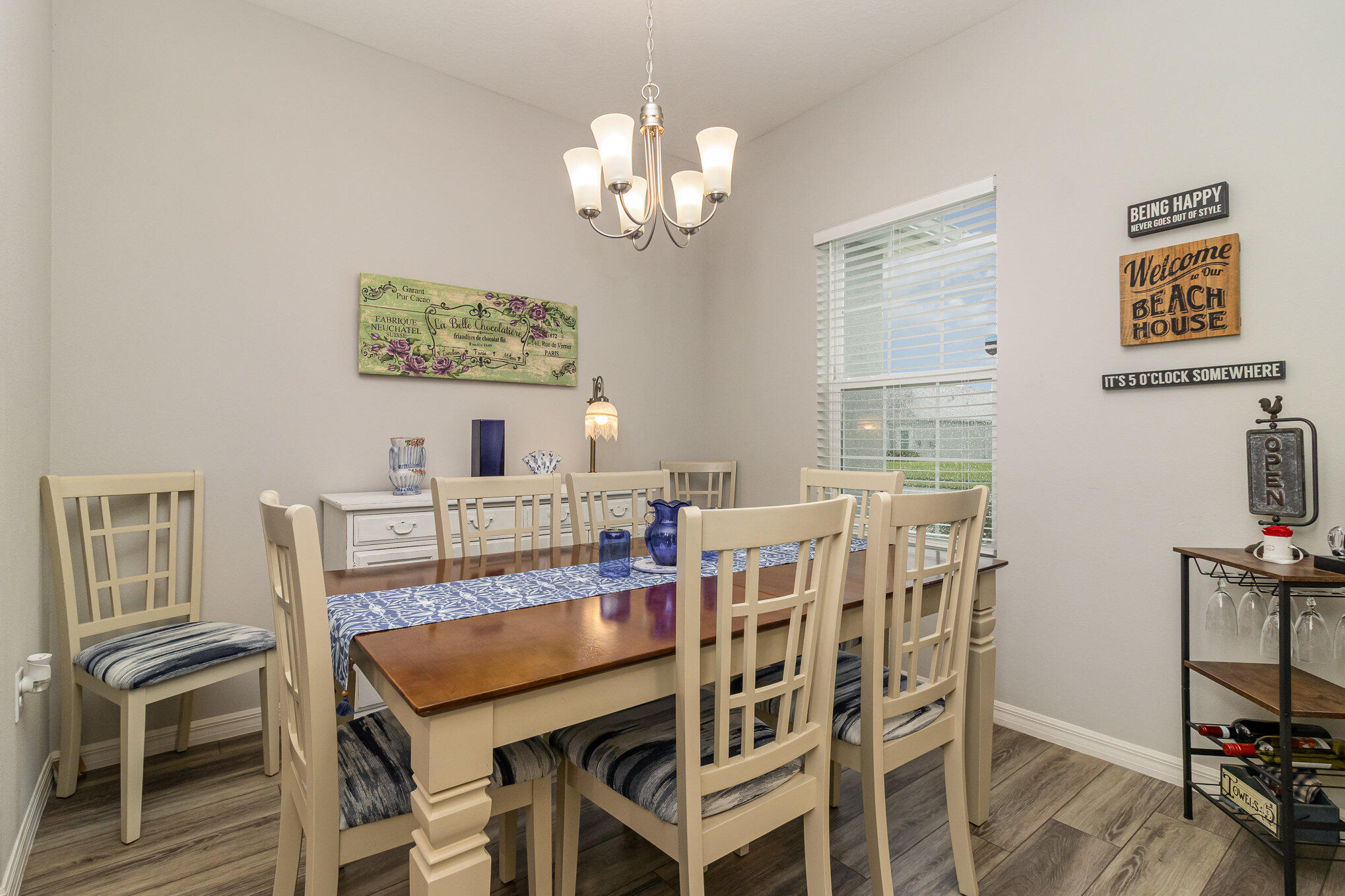 8512 Laguna Circle Micco, FL 32976 - Photo 11 of 24 a dining room with furniture and window