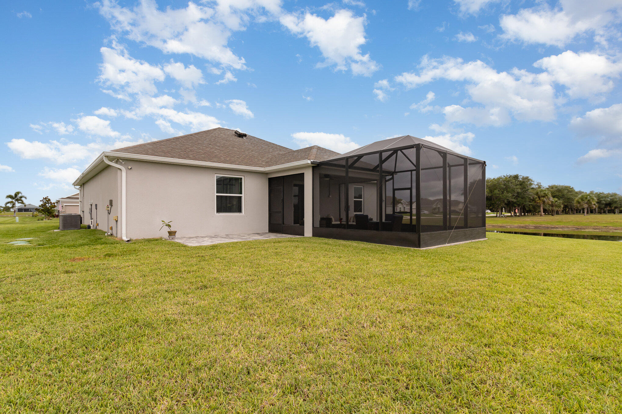 8512 Laguna Circle Micco, FL 32976 - Photo 21 of 24 a view of a house with a backyard
