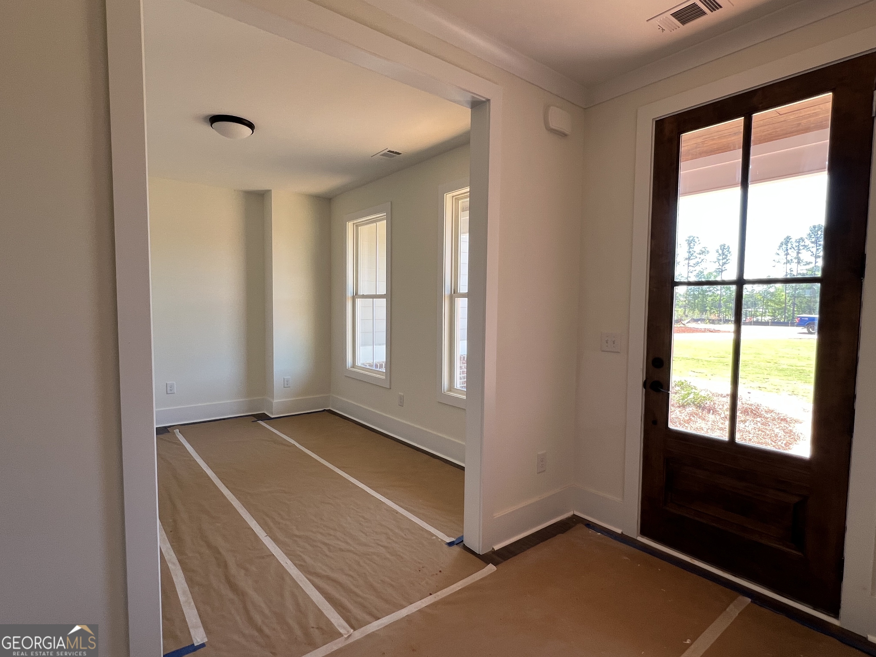 131 Hawthorne Lane Forsyth, GA 31029 - Photo 14 of 31 a view of an empty room with window