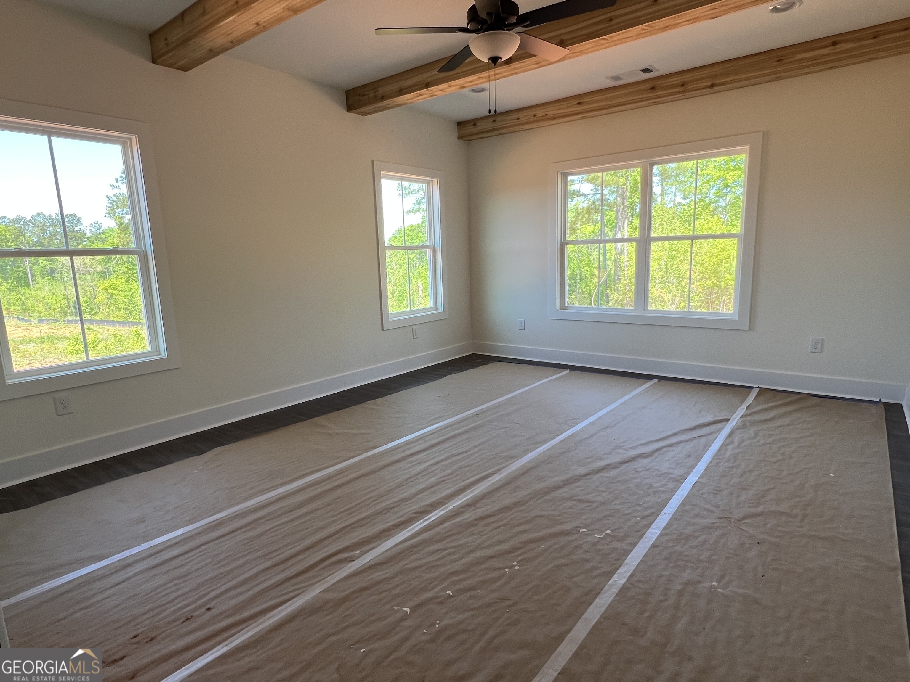 131 Hawthorne Lane Forsyth, GA 31029 - Photo 15 of 31 a view of an empty room with a window