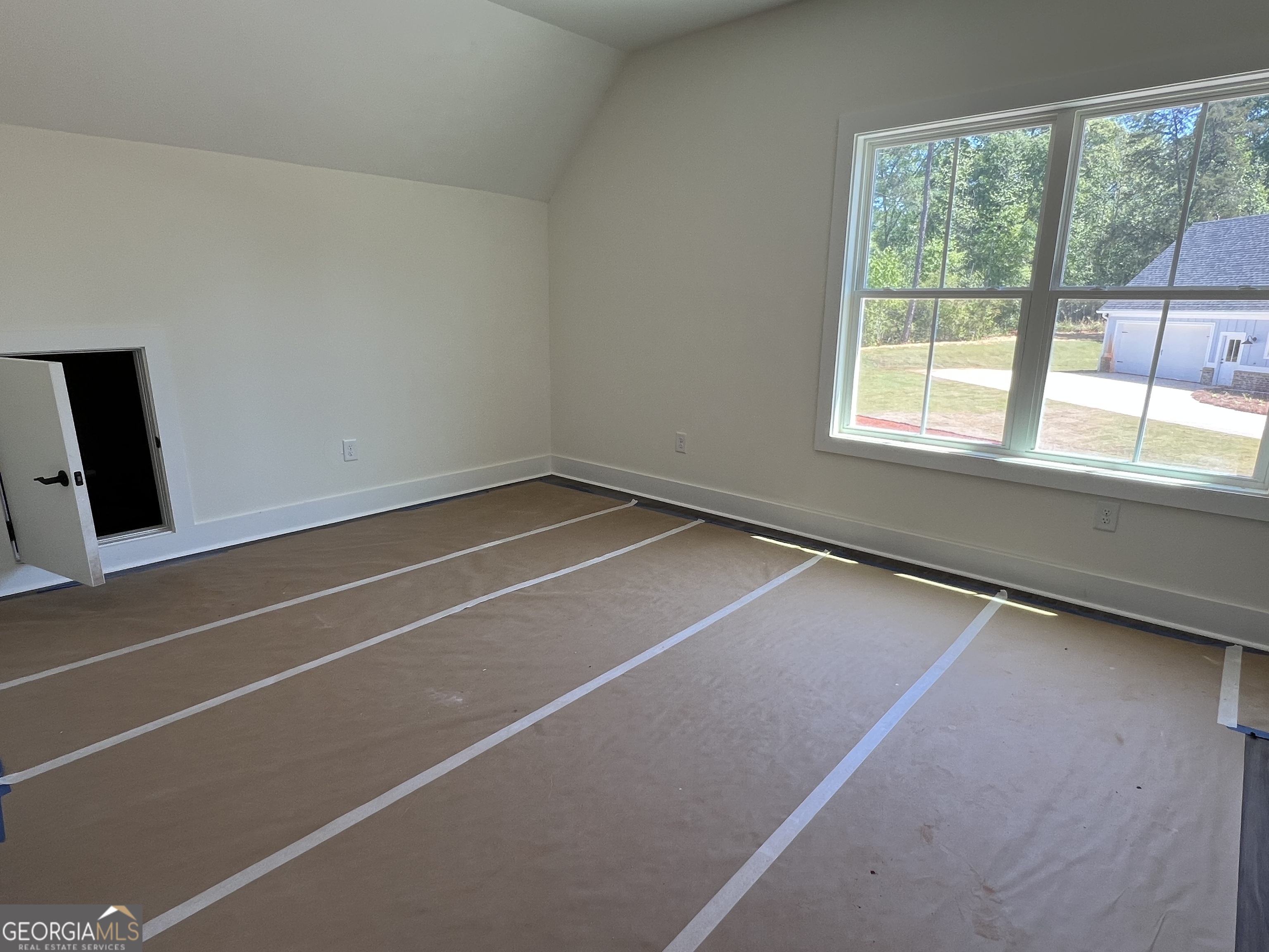 131 Hawthorne Lane Forsyth, GA 31029 - Photo 27 of 31 a view of a room with window