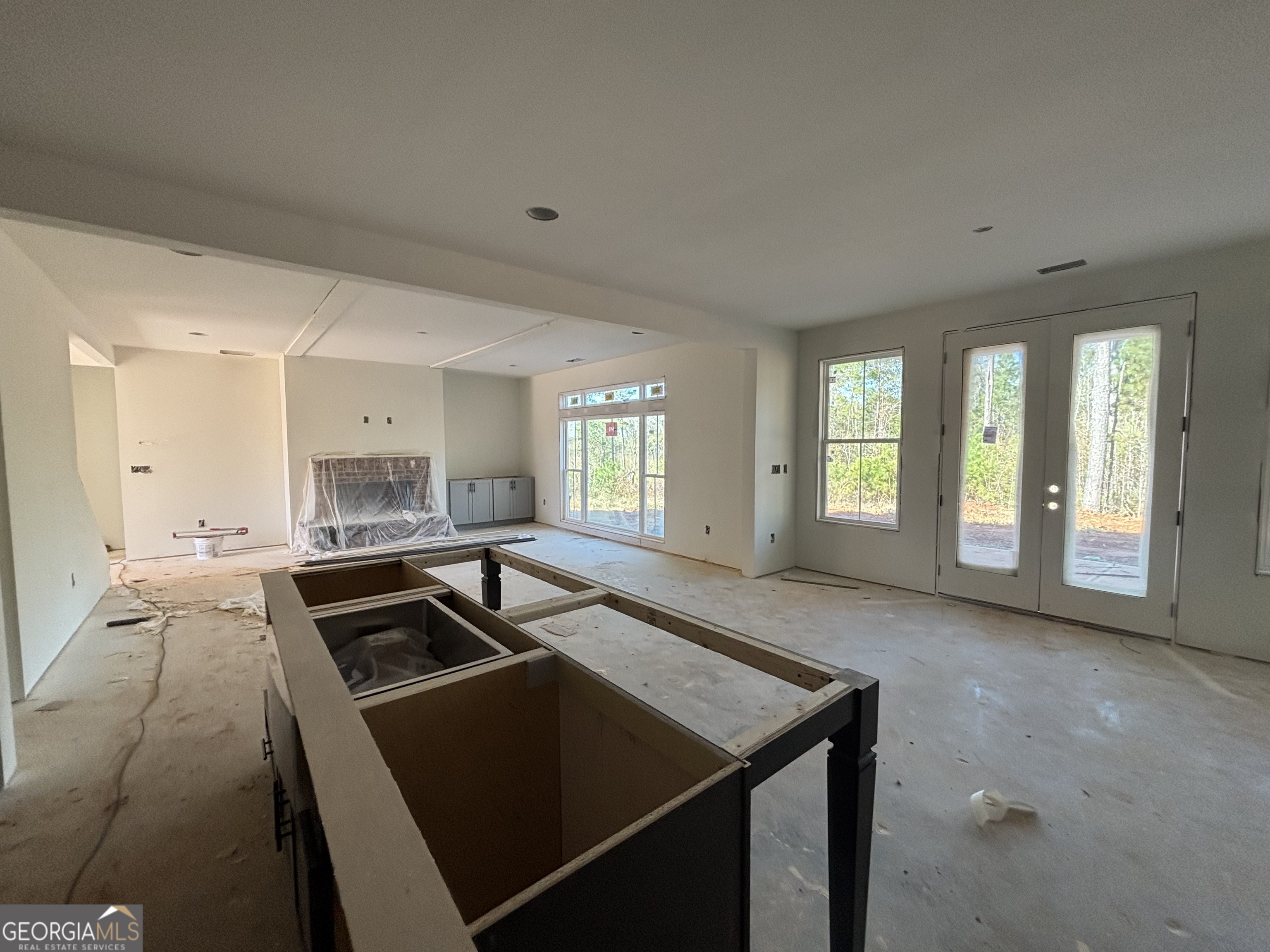 131 Hawthorne Lane Forsyth, GA 31029 - Photo 6 of 14 a kitchen that has a sink and a stove