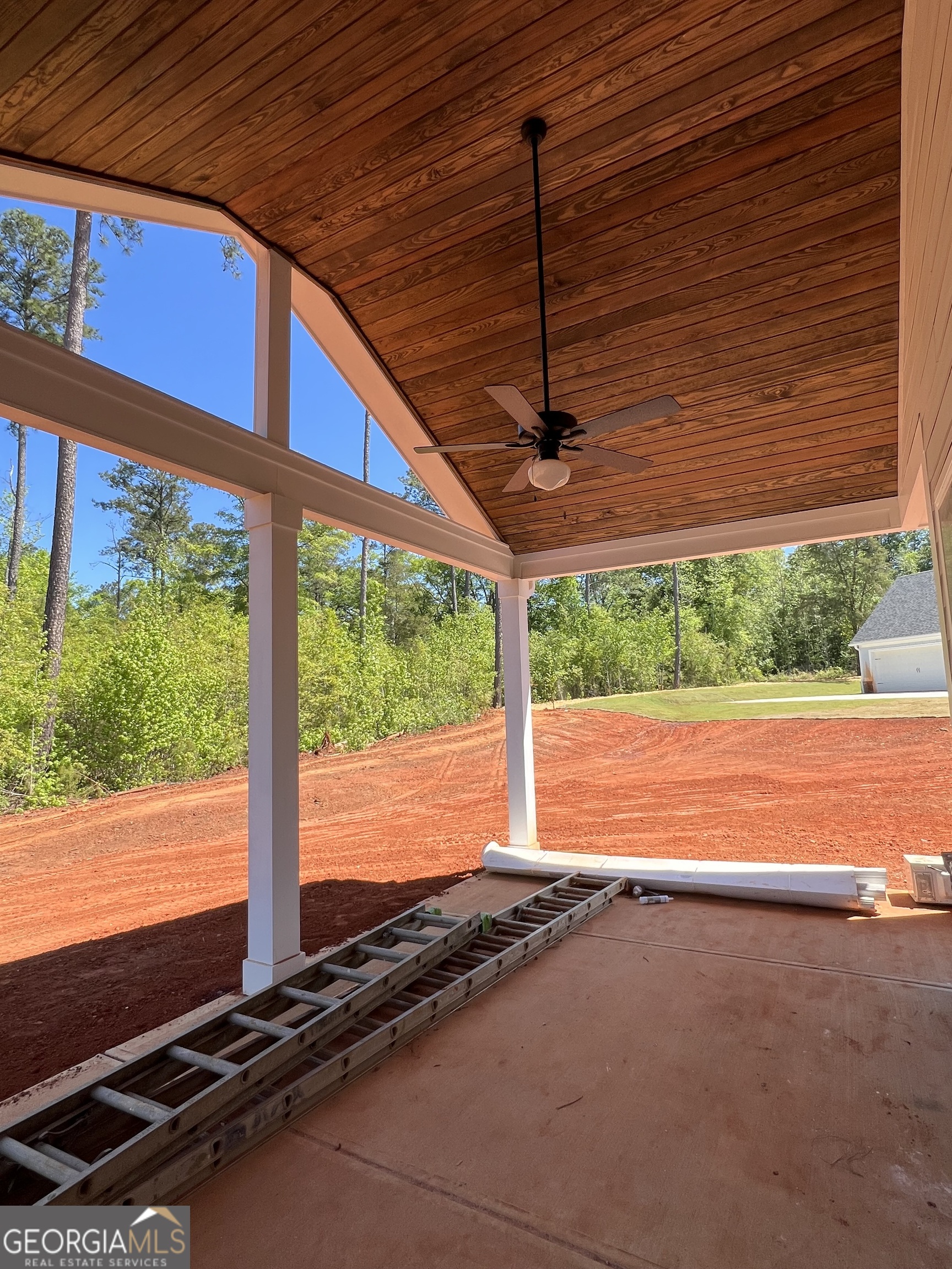 131 Hawthorne Lane Forsyth, GA 31029 - Photo 6 of 31 a view of a two room next to a large window