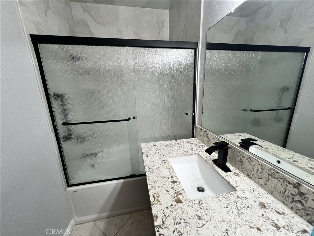 85 Castano Rancho Santa Margarita, CA 92688 - Photo 20 of 35 a bed sitting in a bedroom next to a window