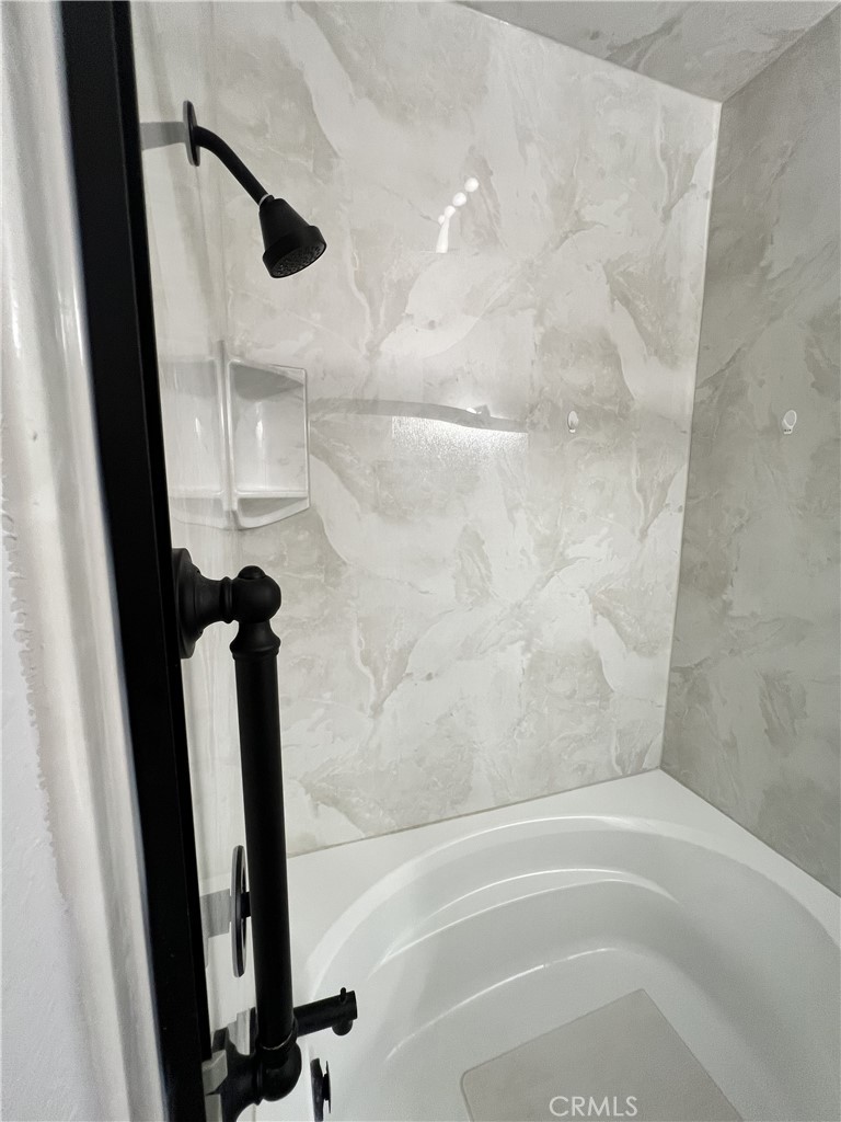 85 Castano Rancho Santa Margarita, CA 92688 - Photo 21 of 35 a bathroom with a shower