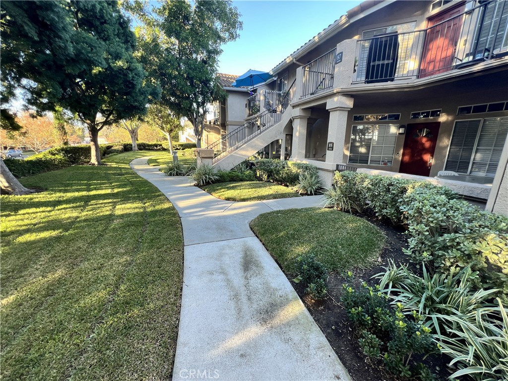 85 Castano Rancho Santa Margarita, CA 92688 - Photo 3 of 35 a view of a building with a garden