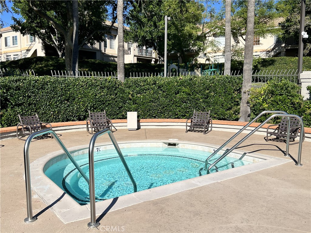 85 Castano Rancho Santa Margarita, CA 92688 - Photo 32 of 35 a view of a swimming pool with a patio and backyard