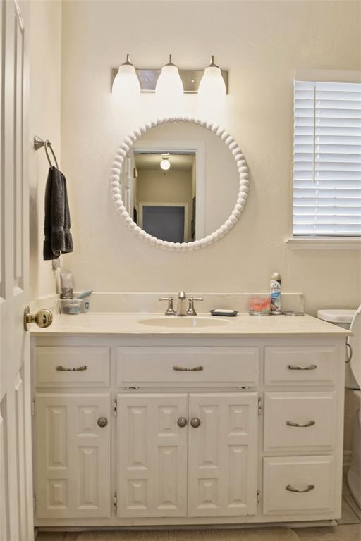 613 Regina Drive Hewitt, TX 76643 - Photo 20 of 33 a bathroom with a sink vanity and mirror