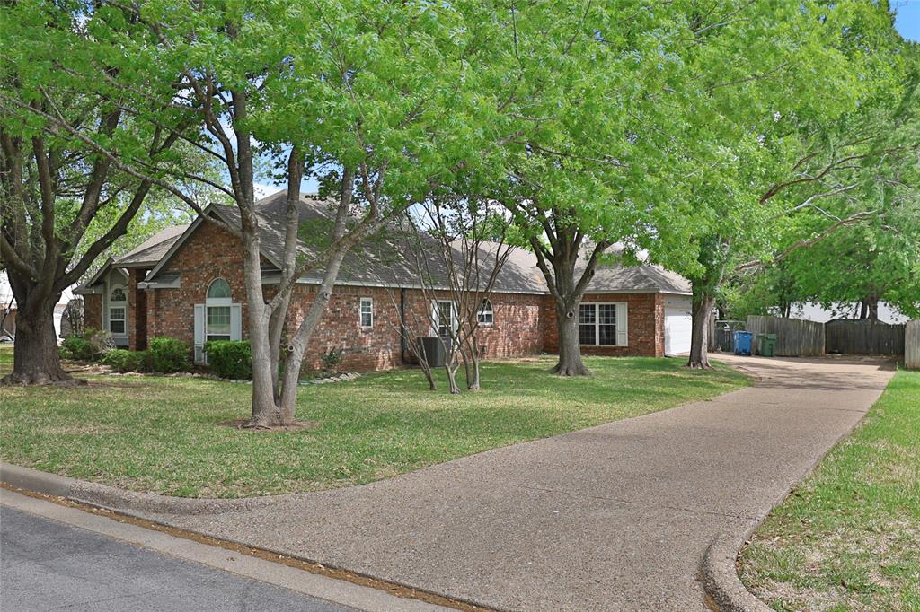 613 Regina Drive Hewitt, TX 76643 - Photo 2 of 33 a front view of a house with a yard